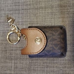 Michael Kors sanitizer holder